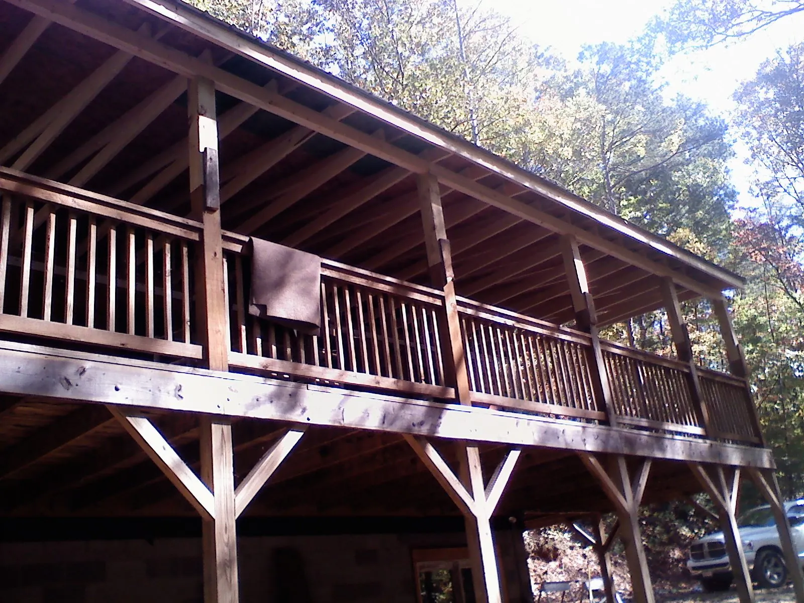 Timber framing under a new elevated porch and deck — Roof Leak Repair in Hartford City by Roofing Brothers